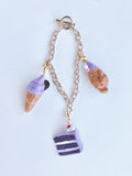 For those of you in a total ube mood, this charm bracelet includes all three of the charms from the Ube Collection: the Ube Soft Serve, the Ube Cake Slice, and the  Ube Taiyaki Ice Cream. Make a bright, bold, and sweet statement with any outfit! The Ube Charm Bracelet is the perfect gift to those with a big sweet tooth and are in love with novelty jewelry.